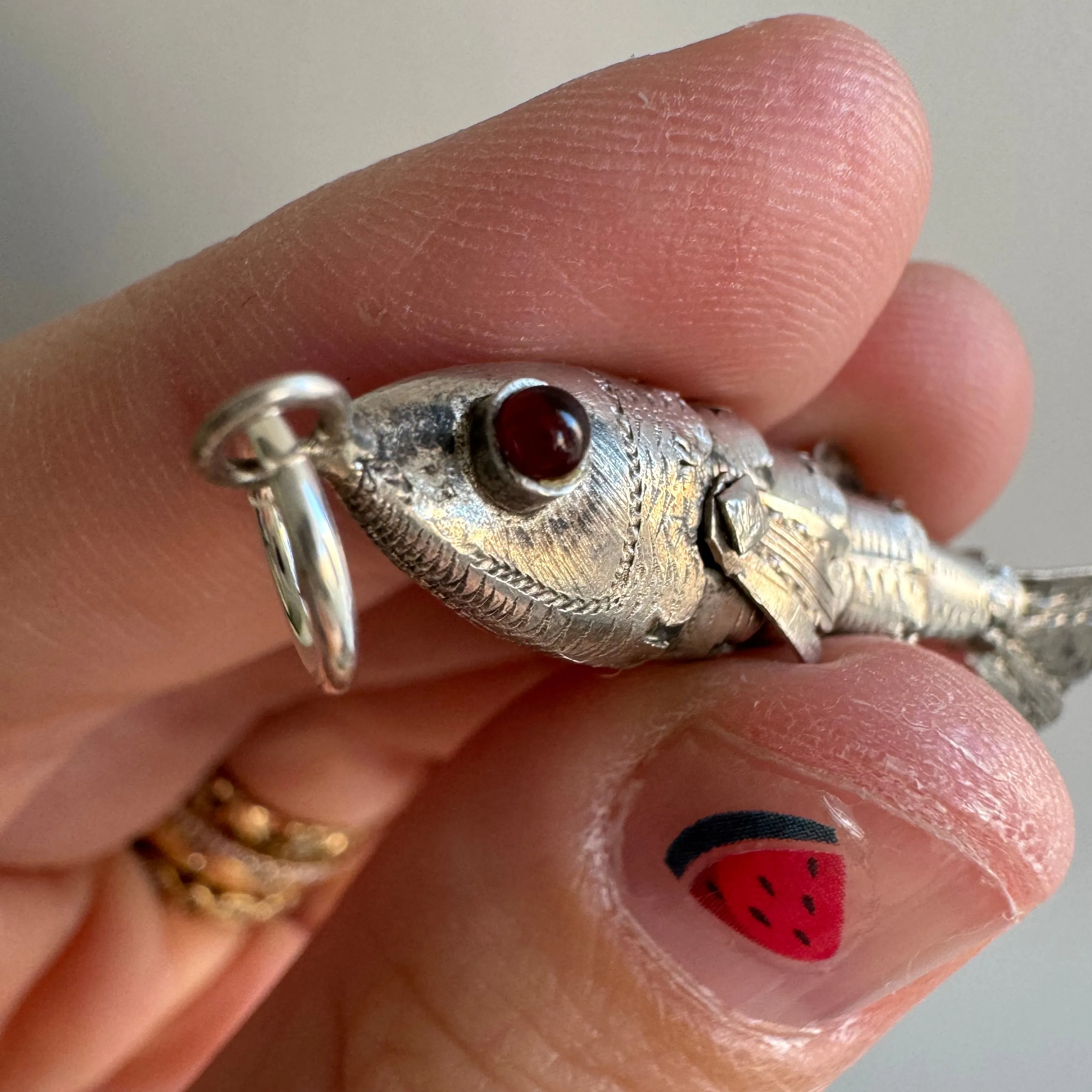 V I N T A G E // lucky catch / silver articulated wiggle fish with burgundy eyes / a pendant